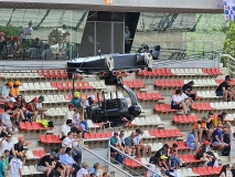 Cable-suspended camera over the pit lane, viewed from Paddock Club