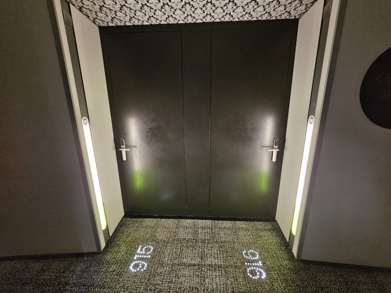 Room numbers projected onto carpet at Barcelo Raval