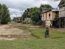 Biking through village, Amazon River